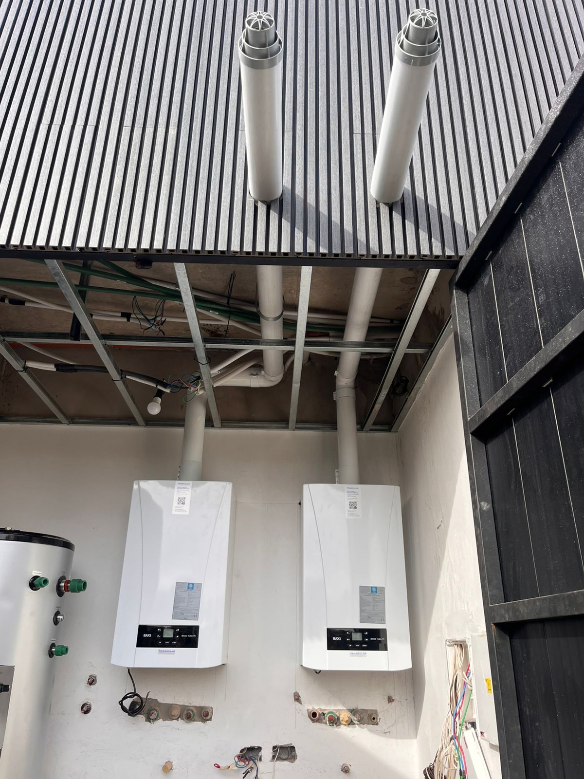 Instalación de calderas BAXI con cañerías y salidas al exterior, CABA